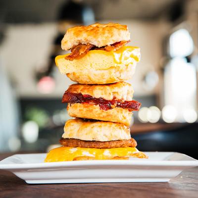 Three biscuit sandwiches stacked on top of each other.