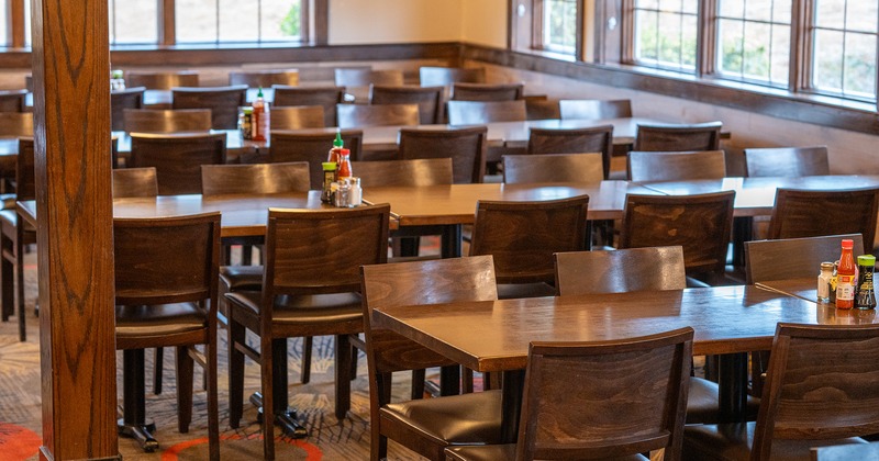 Interior space, dining area, dining tables ready for guests