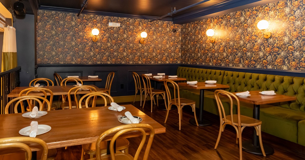 Interior, tables and chairs ready for guests