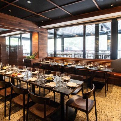 Interior, tables with chairs waiting for the guests