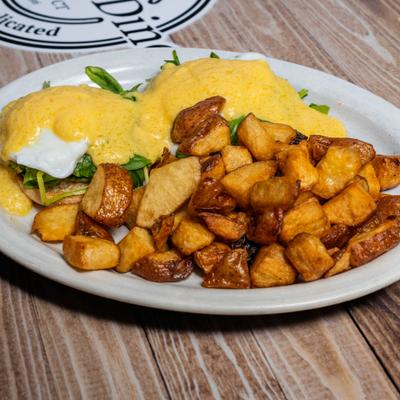 Eggs Florentine and breakfast potatoes.