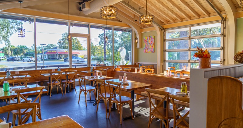 Interior, tables and chairs in dining area