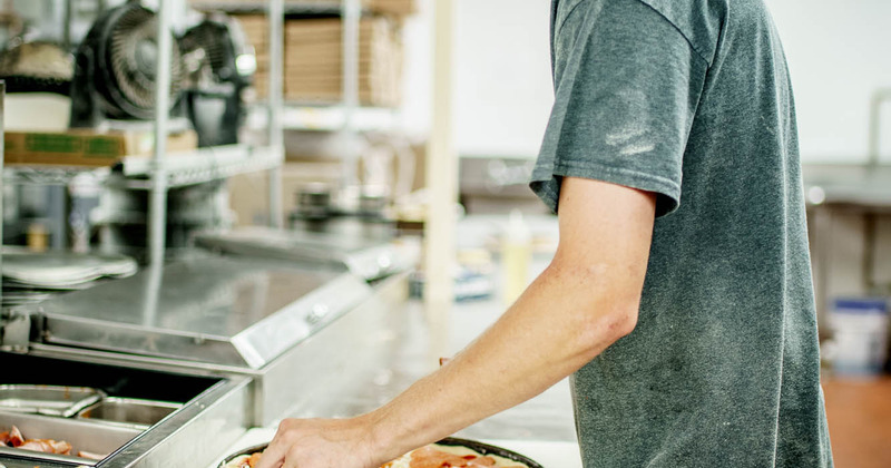 Staff member working in the kitchen