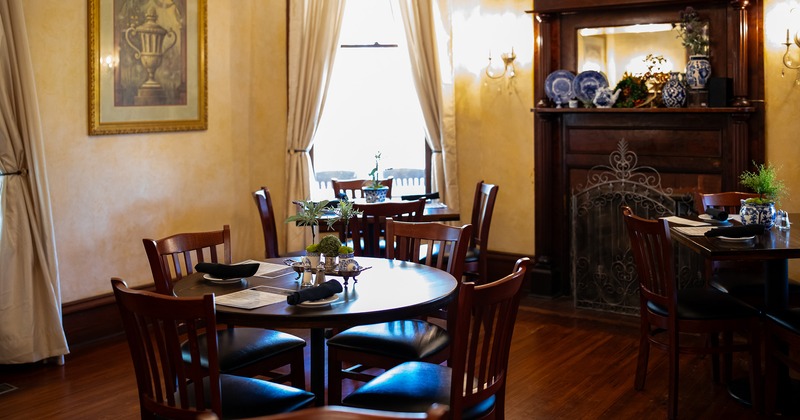 Restaurant interior, dining room with set tables