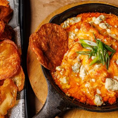 Buffalo Chicken Dip with homemade chips.