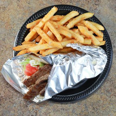 Gyro pita wrap and fries.