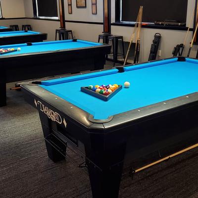 Interior, a space with pool tables.