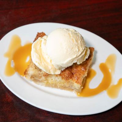Apple cobbler with vanilla ice cream.
