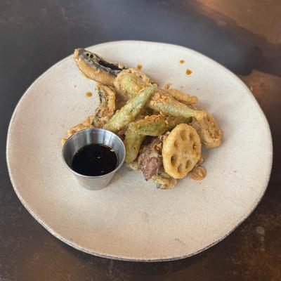 Fried Tofu & Mixed Veggies Satay Fondue with a soy sauce on the side.