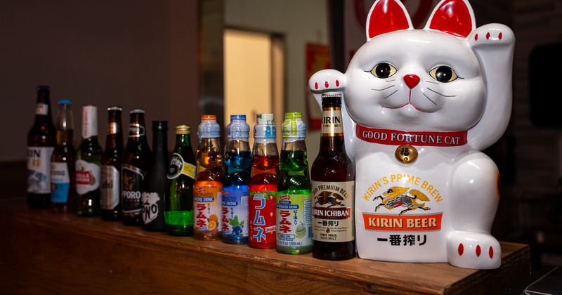 Good fortune cat and drinks