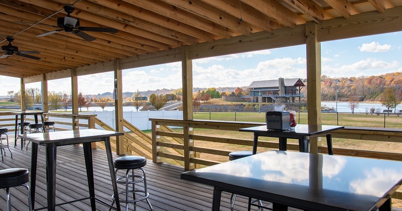 Exterior, covered patio with tables and chairs