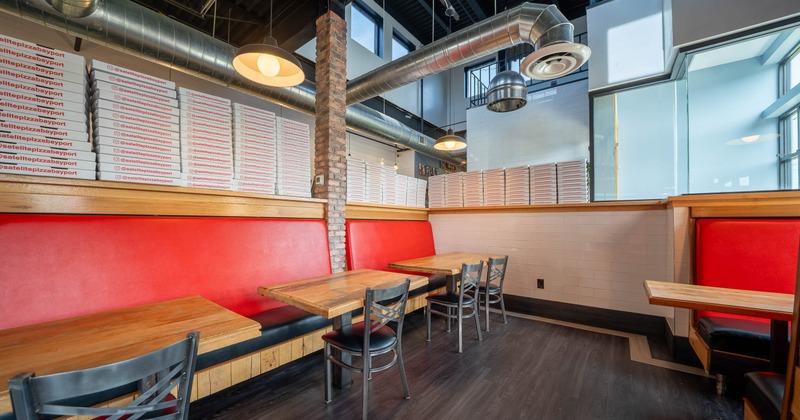 Interior, long seating bench, chairs and tables