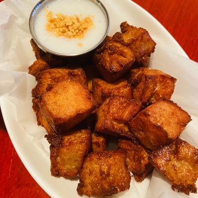 Baked pastry and dip.