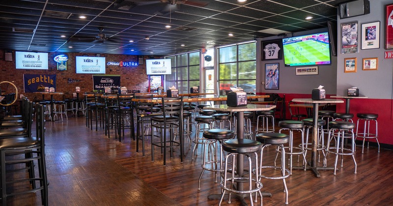 Interior, high tables and chairs in seating area