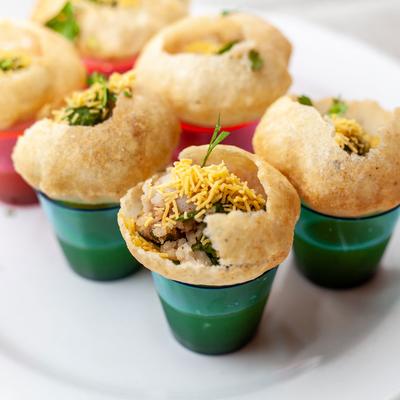 Decorated pastry with rice and dip