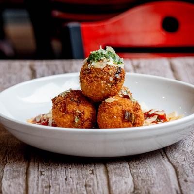 A plate of Arancini.