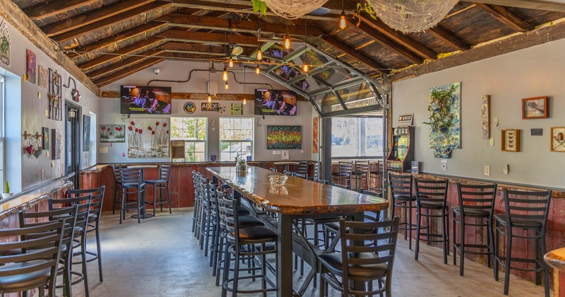 Interior, seating area, tables with bar stools