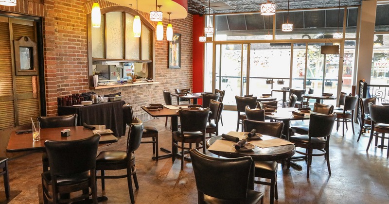 Cozy interior dining area with set tables ready for guests