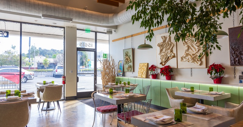 Diner area, tables and chairs, entrance from street