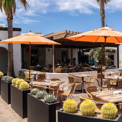 Exterior, seating area, tables covered with parasols