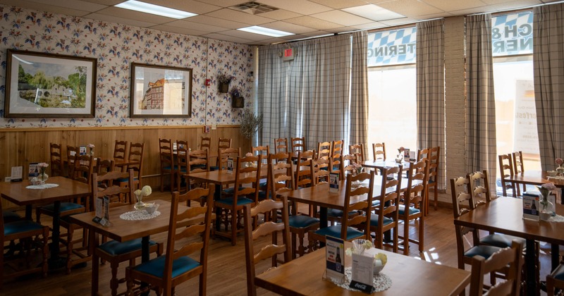 Cozy interior with wooden tables and floral decorations