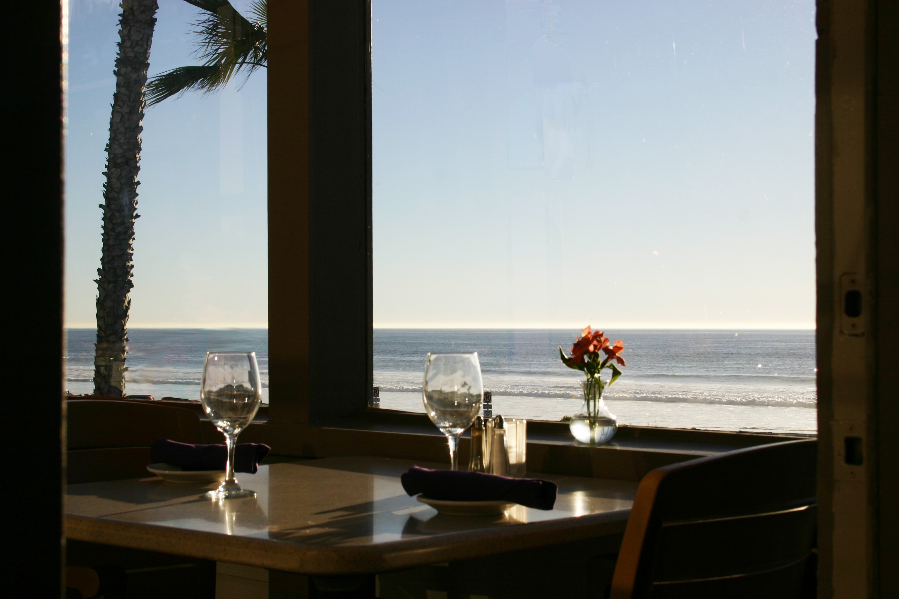 Dining table with ocean view on front balcony