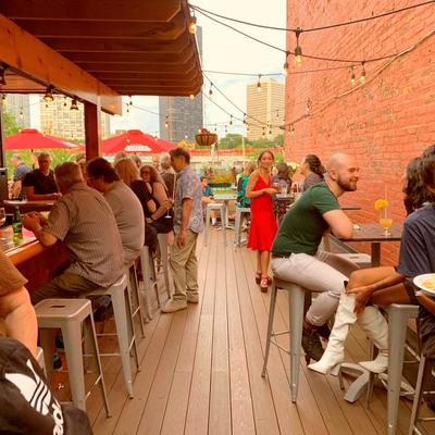 Customers sitting outside.