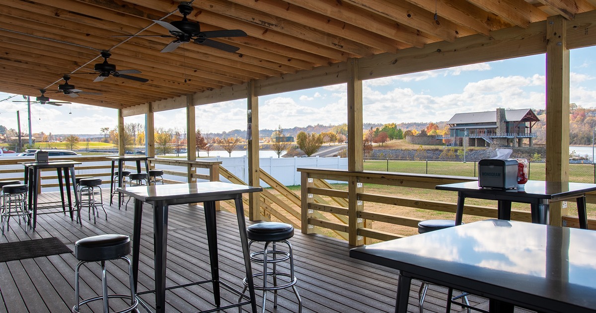 Covered patio with tables and chairs
