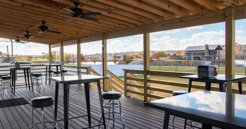 Covered patio with tables and chairs