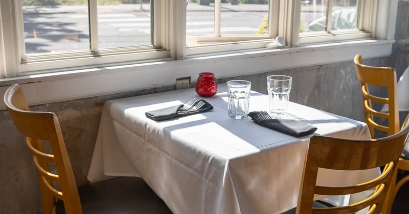 Interior, guest table for two by a window