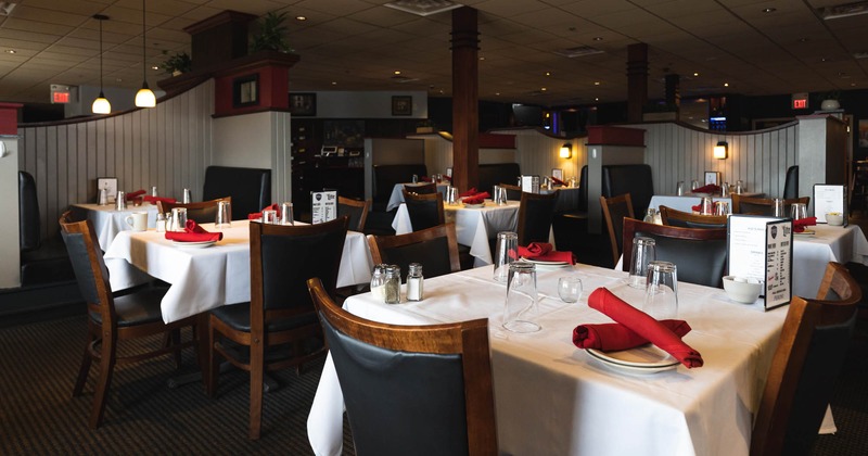 Interior, set dining tables and restaurant booths