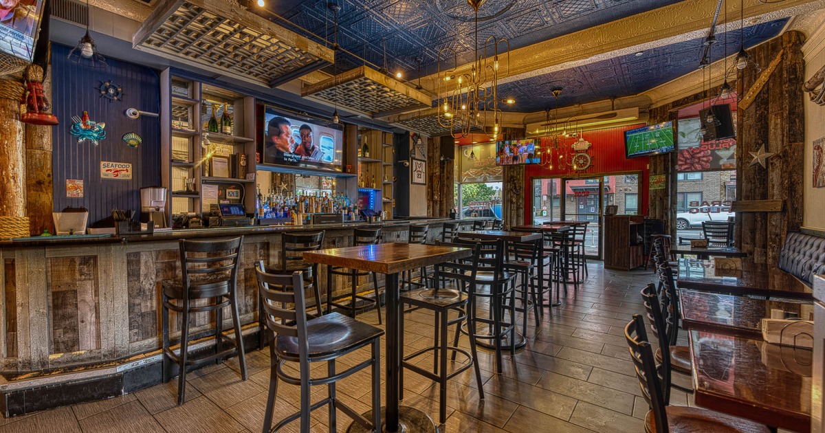 Interior, tables, chairs and stools ready for guests