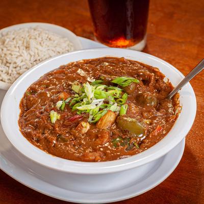 Stew with meat and vegetables, rice on the side