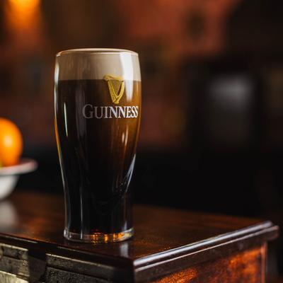 A glass of dark Guinness beer.