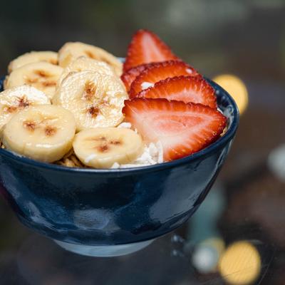 Greek yogurt, blueberries, strawberries, granola, honey.