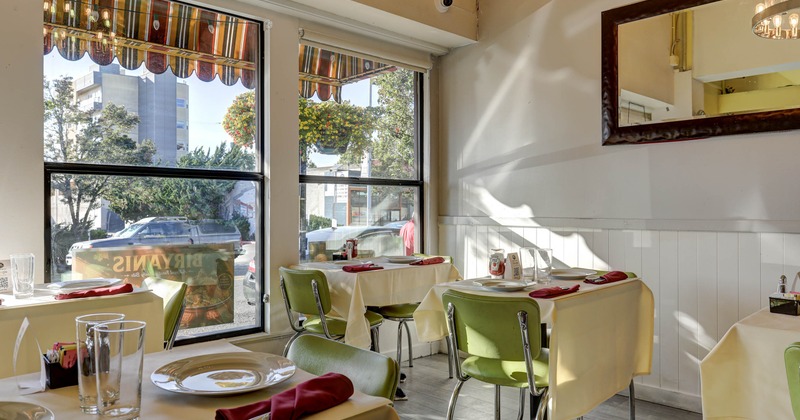 Interior, tables set and ready for guests