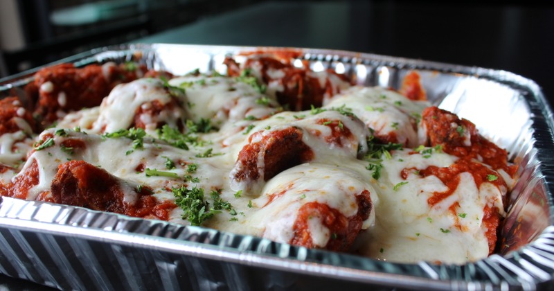 A catering tray with lasagna