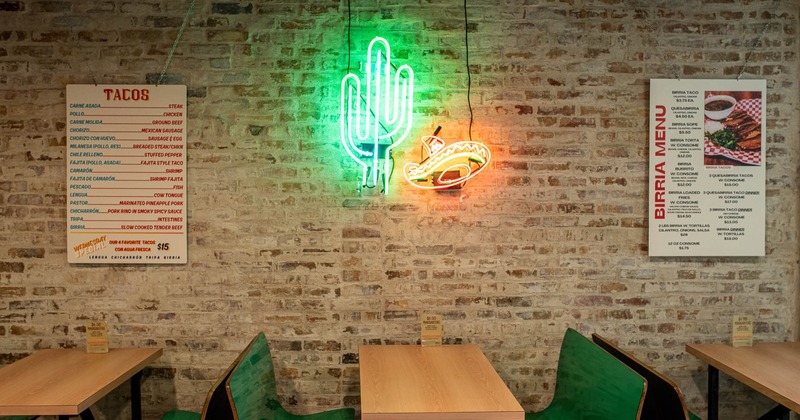 Seating area, with wall menu and neon lights