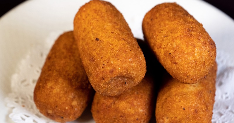 Croquetas bechamel fritters with chicken and serrano ham.