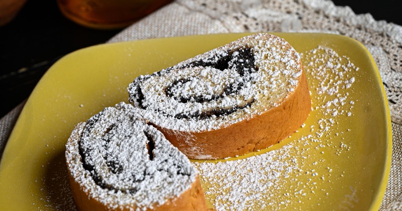 Poppy seed rolls topped with powdered sugar