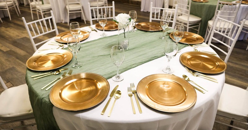 Interior, gold colored plates on the table