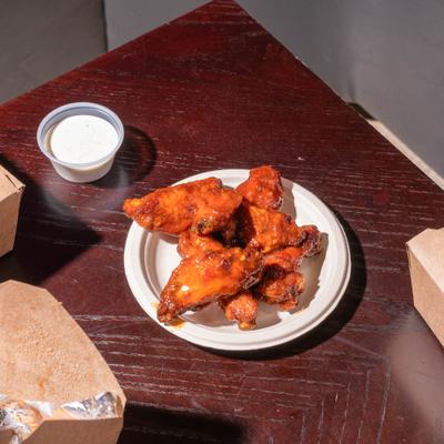 Honey Habanero Wings, with dipping sauce.