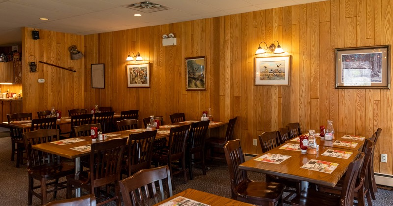 Interior, tables with chairs near the wall