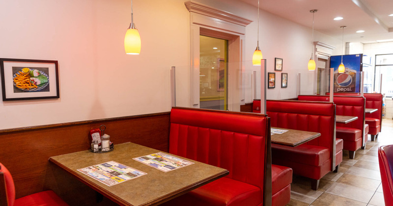 Restaurant interior, seating area, framed photos on the wall