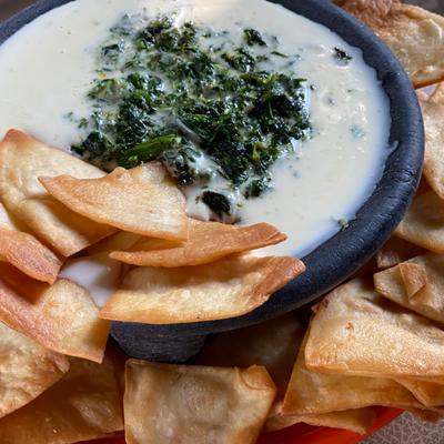 Spinach dip with pita chips.