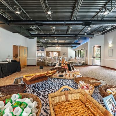 Interior, a table with snacks, dining area in the background