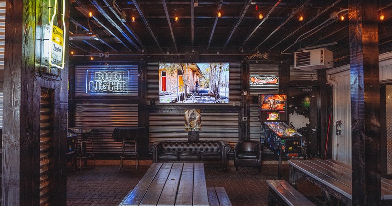 Interior, bench seating, big TV on the wall