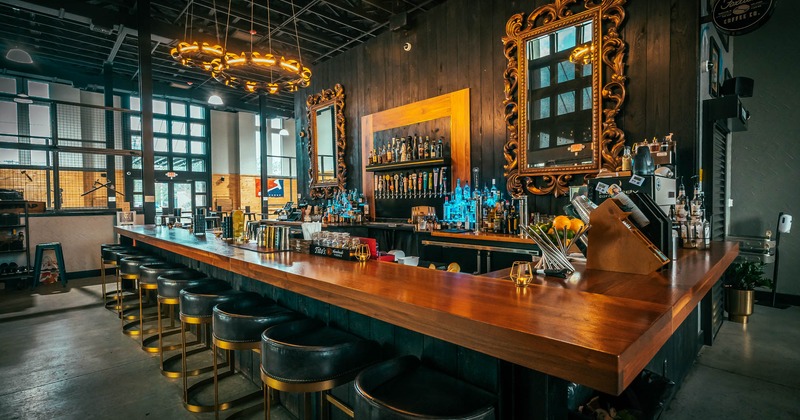 Bar Area - bar stools neatly lined up along the counter