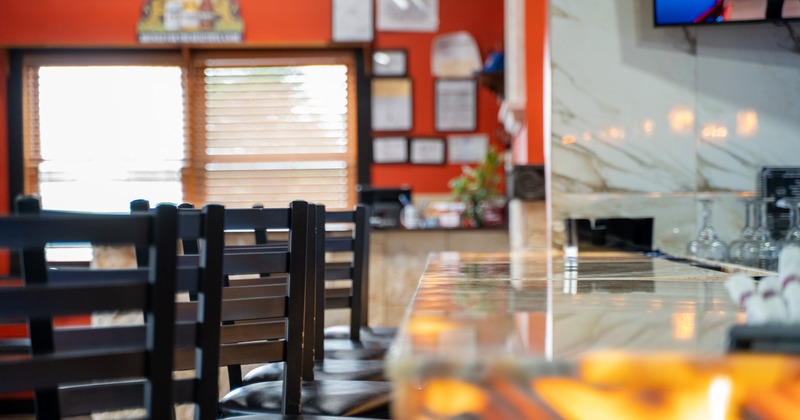 Part of diner room, part of drink rack and bar