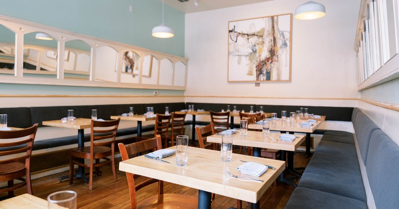 Interior, tables set for guests